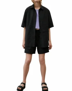 Chemise manches larges poches noire