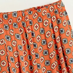 Pantalon Peanut ample à motif orange