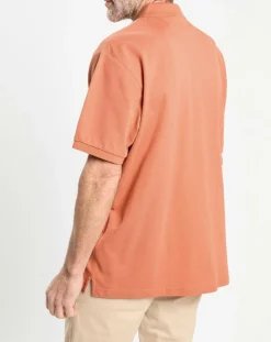 Polo manches courtes uni piqué orange moyen