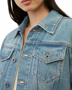 Veste en jean courte à boutons bleue